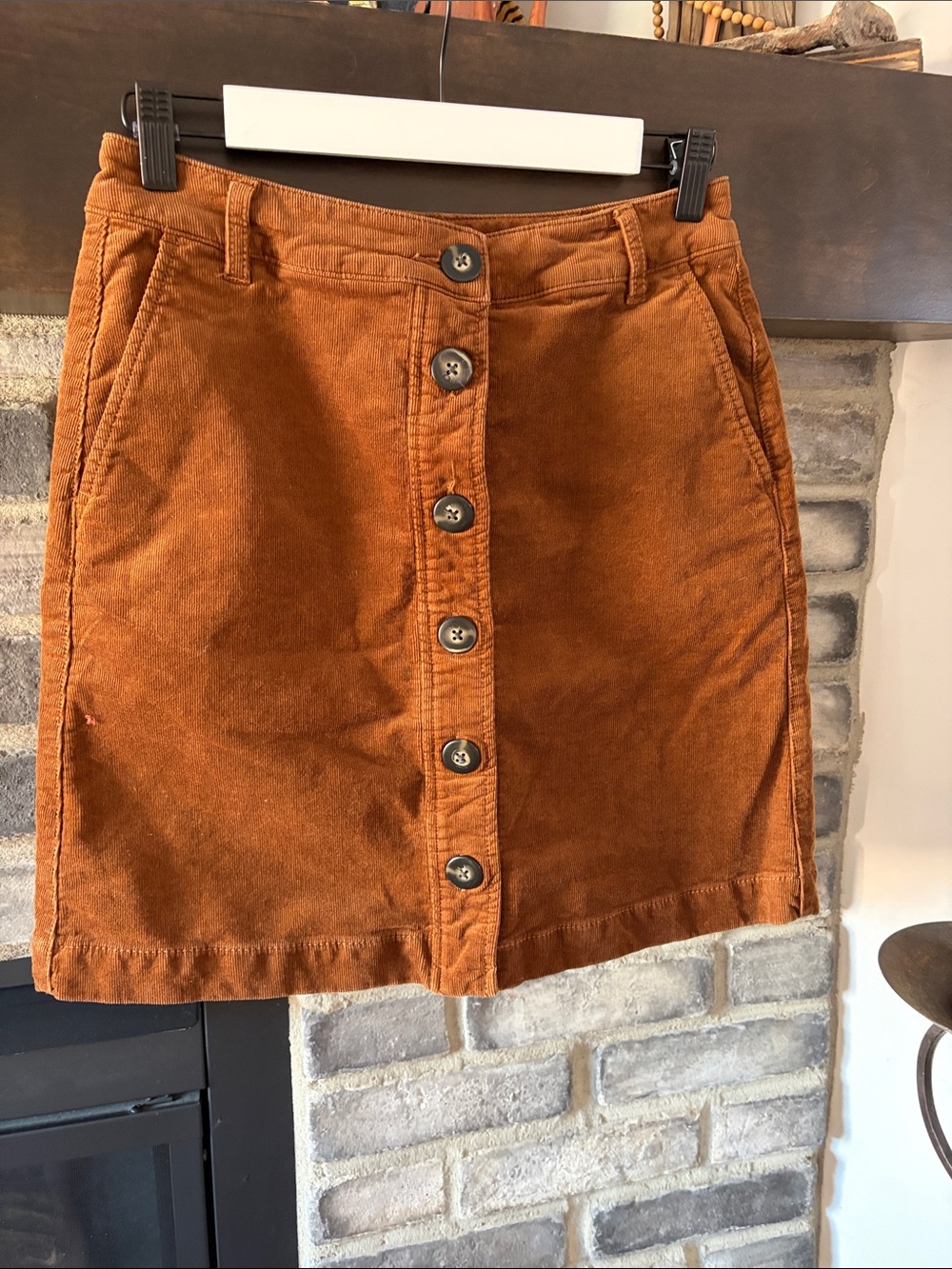 CAbi Button-Front Corduroy Mini Skirt in Rust